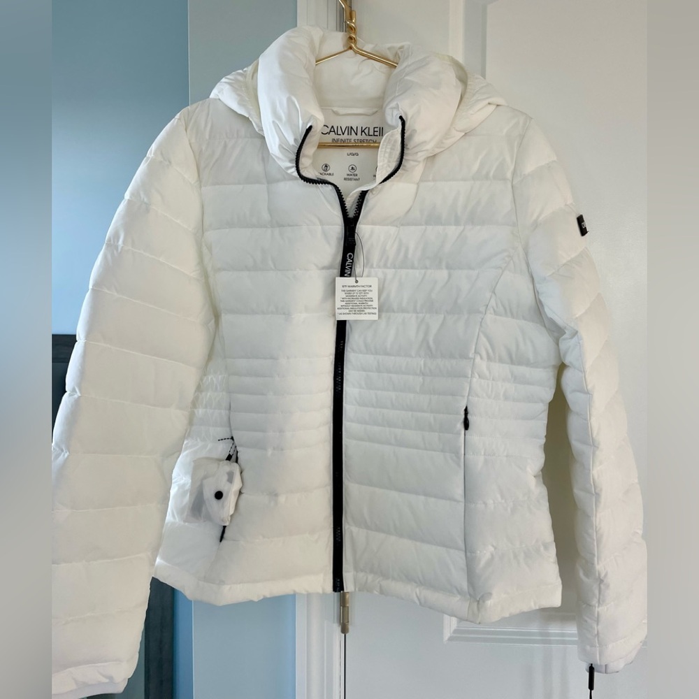 Calvin Klein infinite stretch puffer. Size large. New with tags